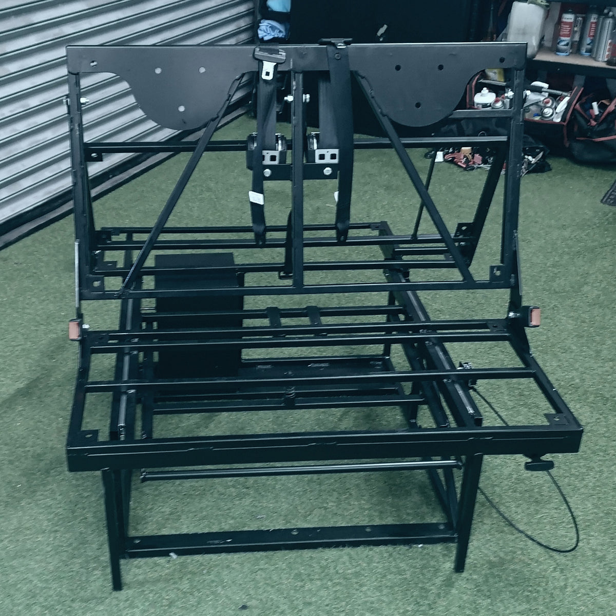 Black metal double seat bed frame on leveling legs