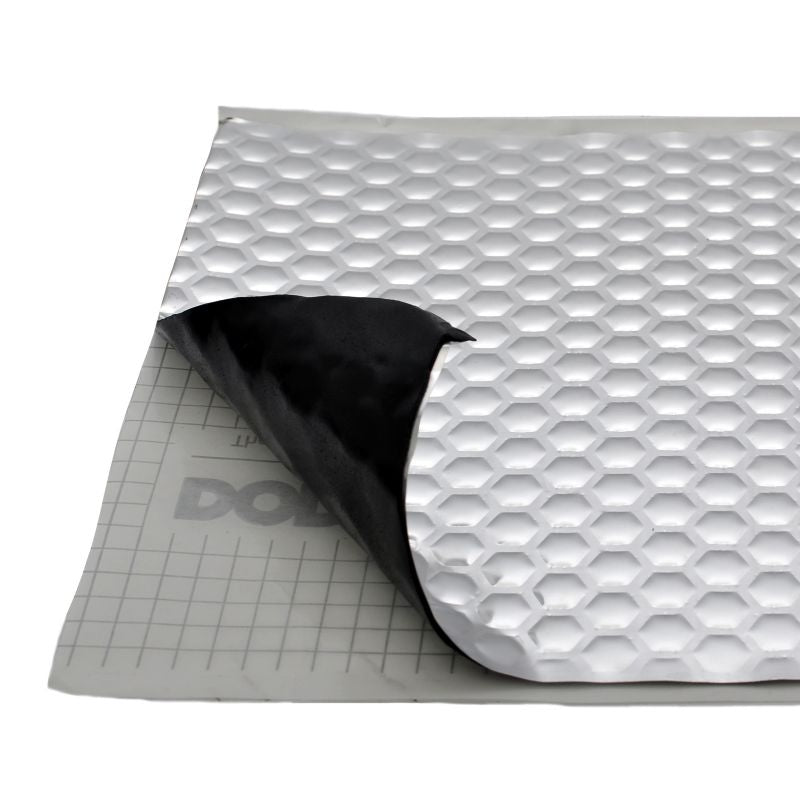 Silver hex-pattern campervan insulation lining with dark backing