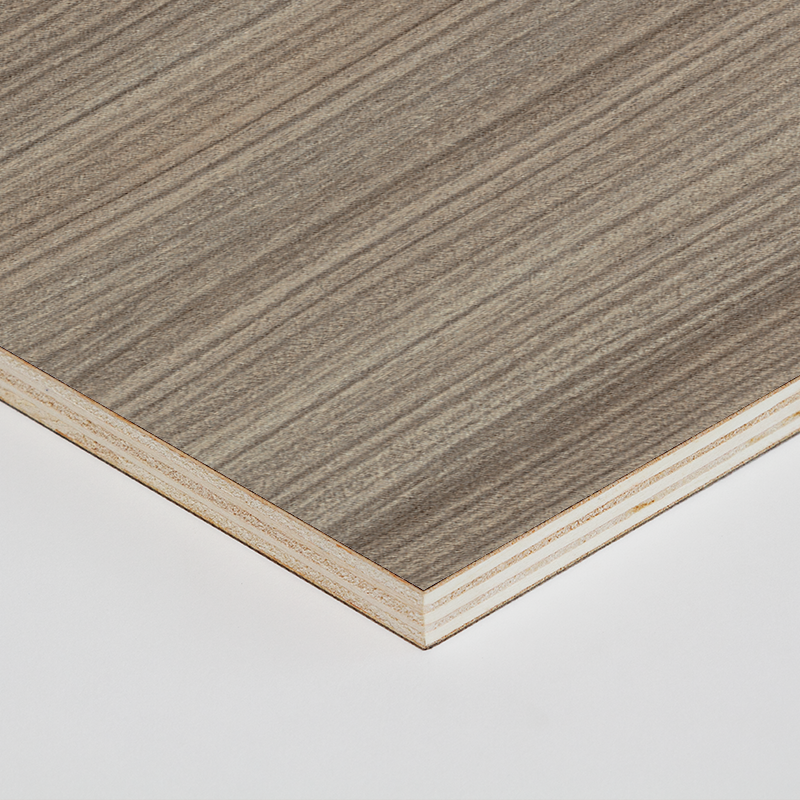 Gray woodgrain worktop corner with pale layered edge trim.