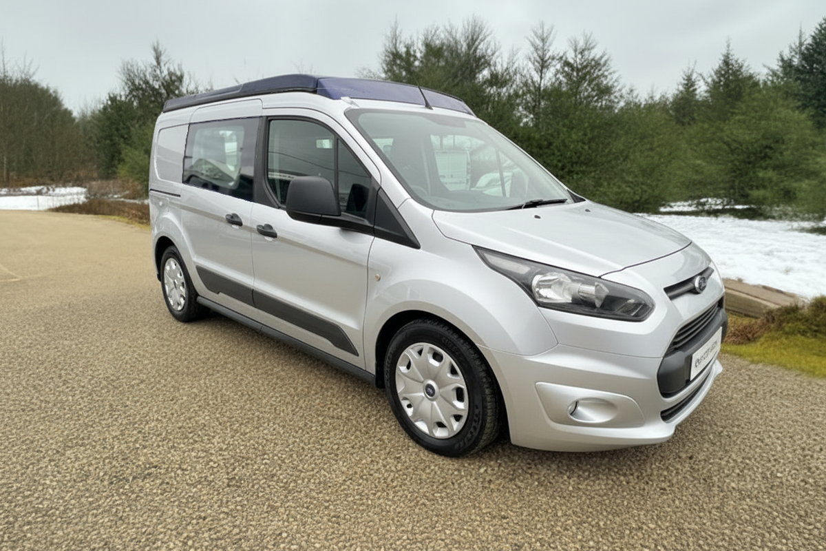 White Ford Connect panel van with side window and front bumper, camper conversion