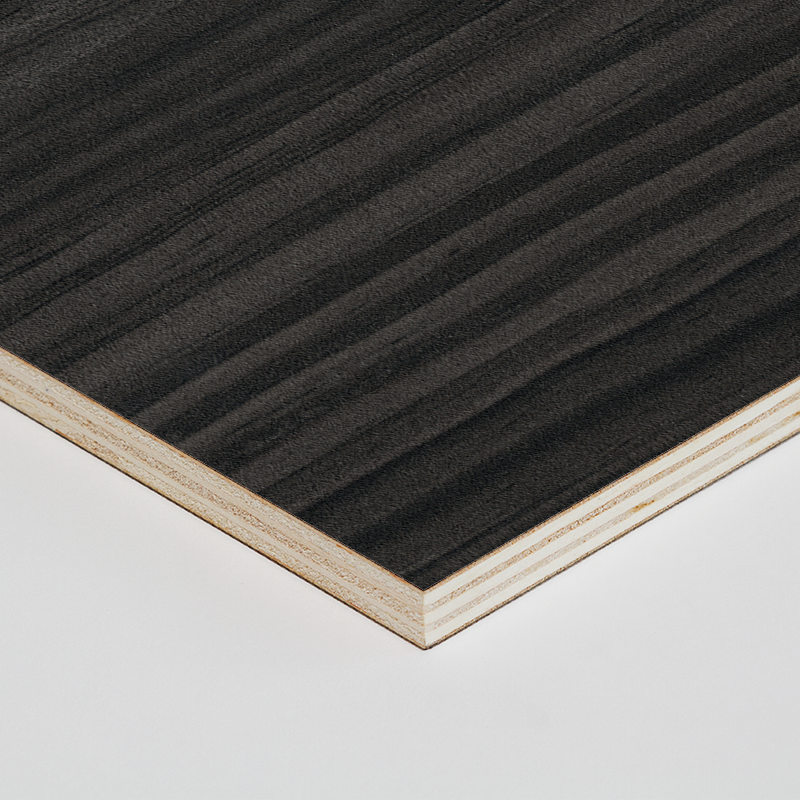 Dark woodgrain worktop corner with pale layered edge trim.