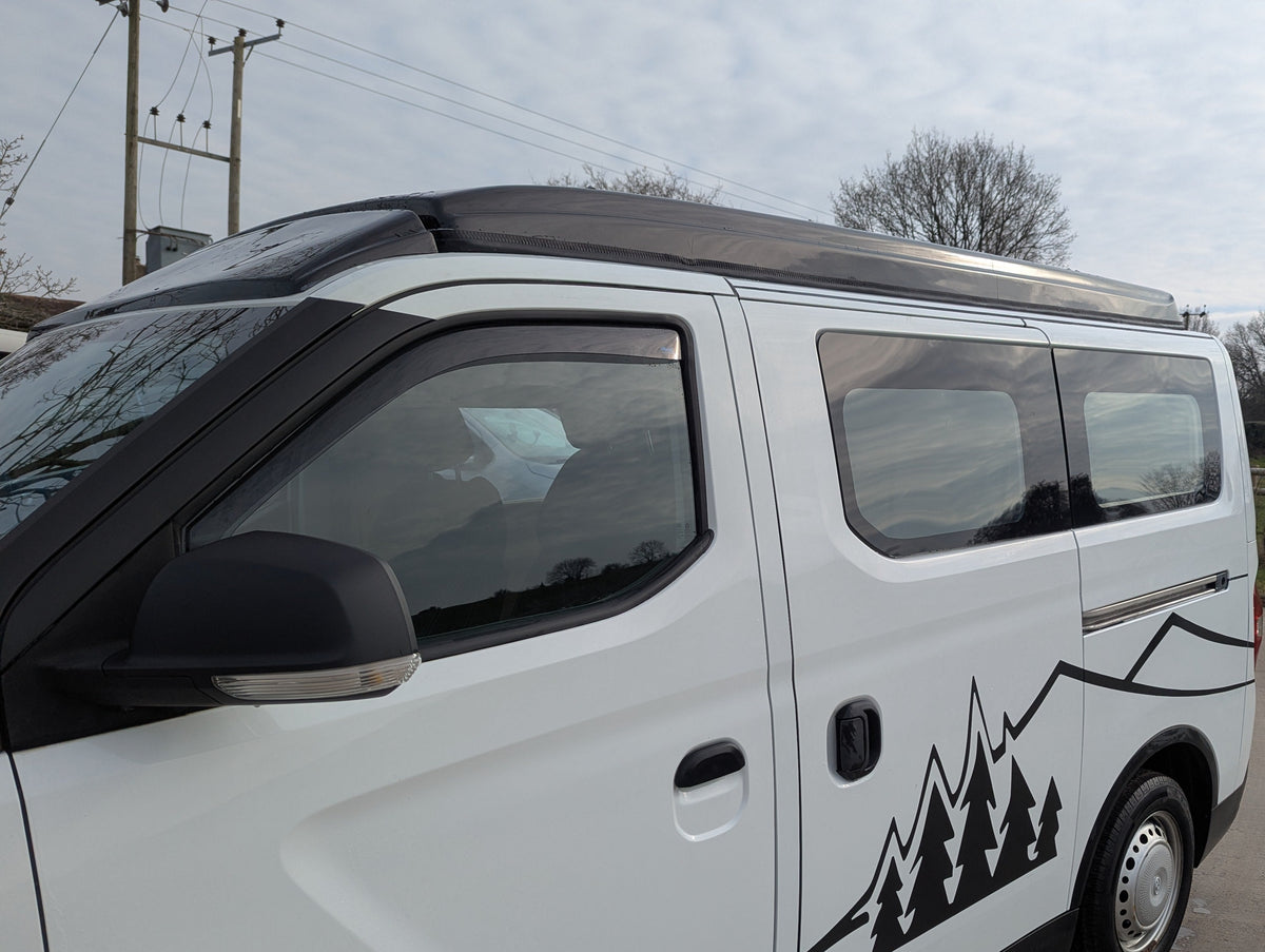 Upgrade your SAIC Maxus eDeliver 3 campervan with the Stargaze Rear Elevating Roof and optional window installation. Enhance headroom, ventilation, and natural light for a more comfortable and spacious adventure. Professionally fitted with high-quality materials.