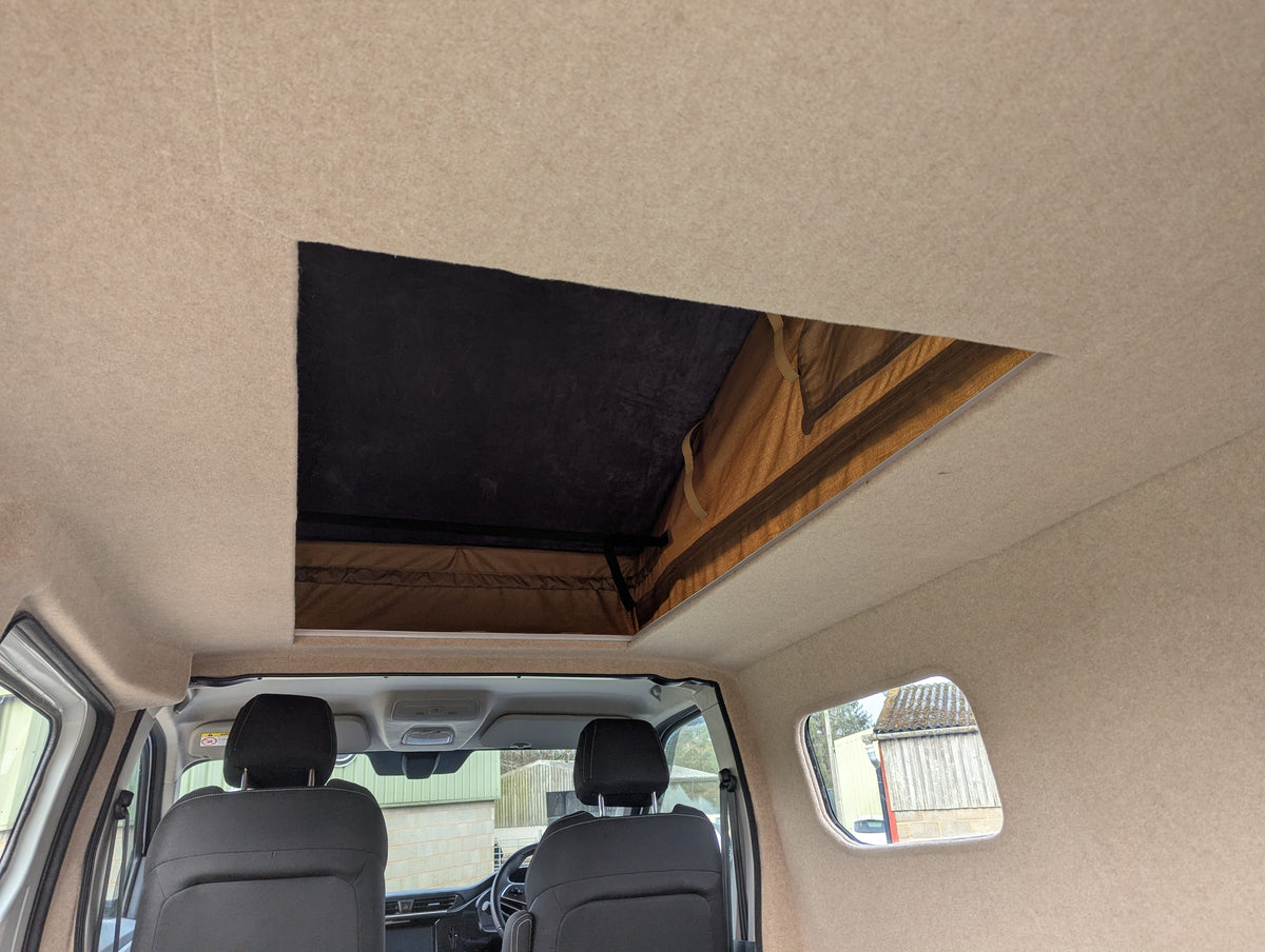 Upgrade your SAIC Maxus eDeliver 3 campervan with the Stargaze Rear Elevating Roof and optional window installation. Enhance headroom, ventilation, and natural light for a more comfortable and spacious adventure. Professionally fitted with high-quality materials.