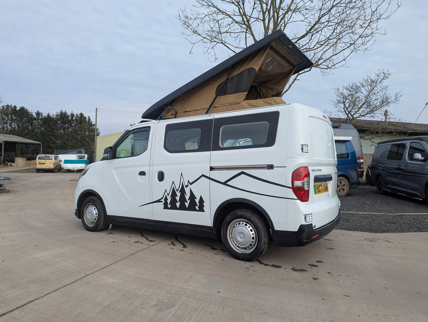 Upgrade your SAIC Maxus eDeliver 3 campervan with the Stargaze Rear Elevating Roof and optional window installation. Enhance headroom, ventilation, and natural light for a more comfortable and spacious adventure. Professionally fitted with high-quality materials.