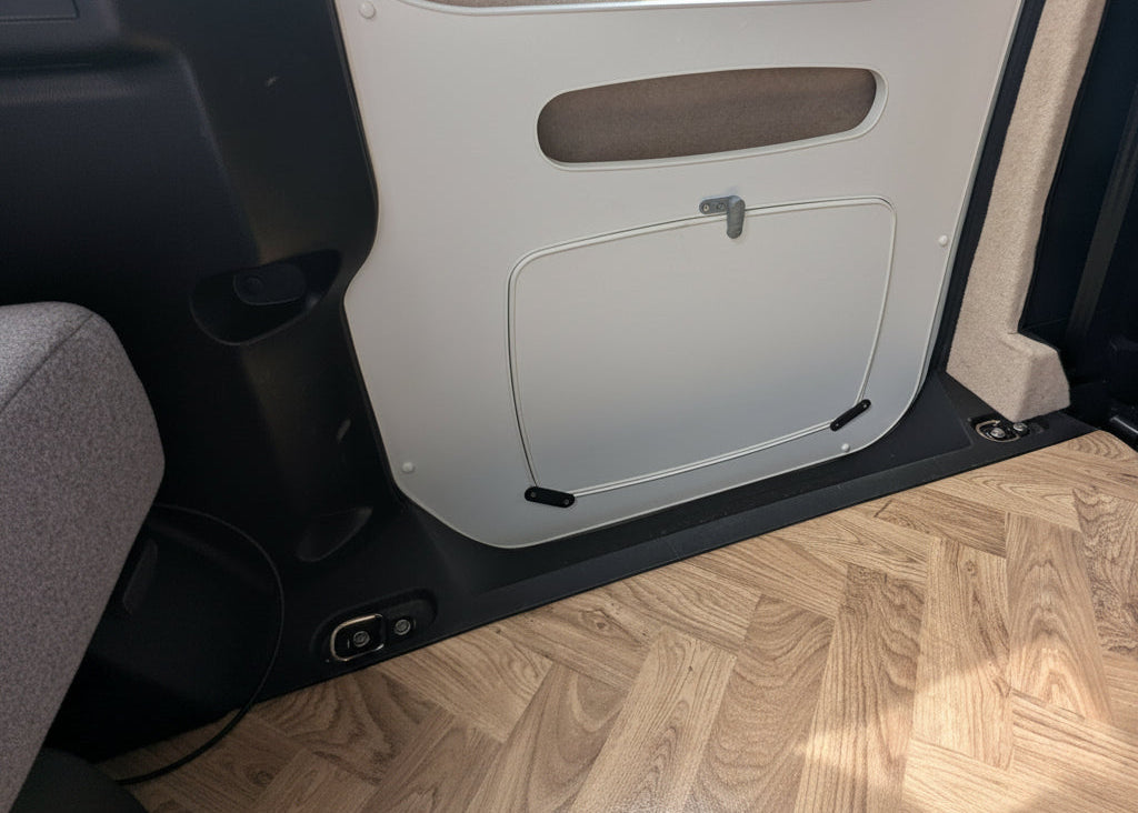 Sliding door table insert fitted inside The Wyre VW ID. Buzz electric campervan conversion by CCCAMPERS.