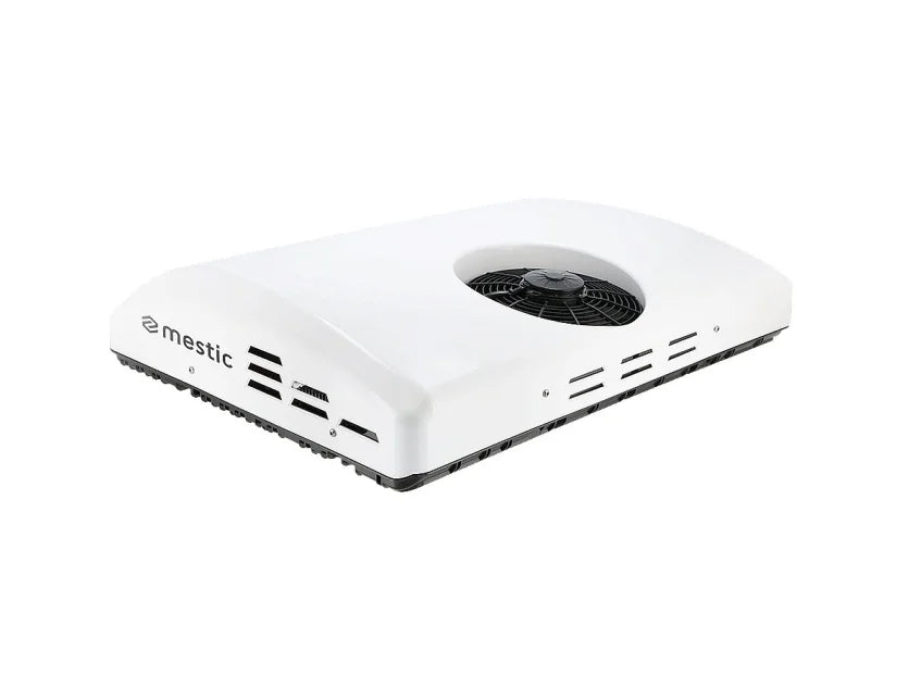 Mestic roof-mounted air conditioner unit, white housing with circular fan vent on top