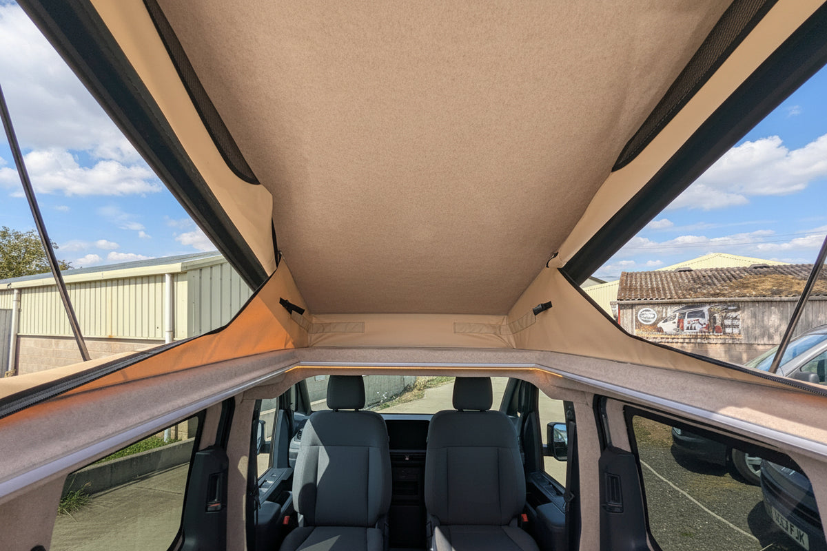 Kia PV5 beige canvas pop top roof 