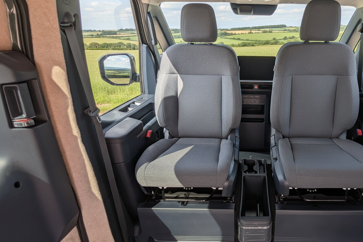 Kia PV5 passenger swivel seat professionally fitted by CCCampers — M1 Tested & Certified, with lowered centre console, Worcestershire