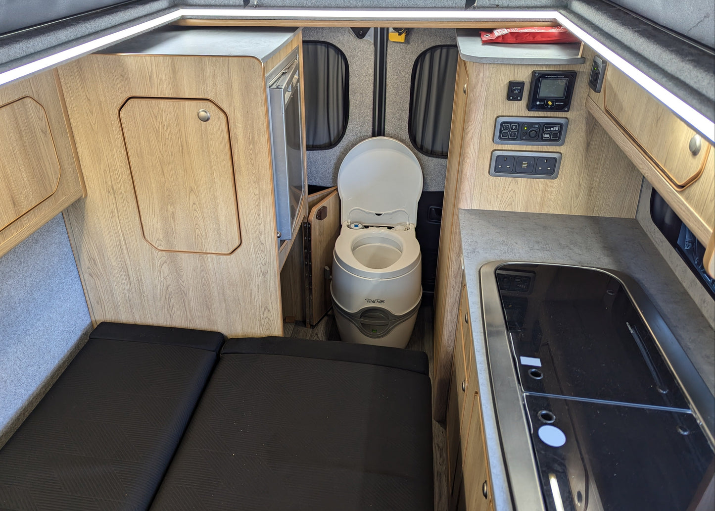 The Flagship Mamble Nissan Primastar Campervan Conversion —Side Lounge | CCCAMPERS