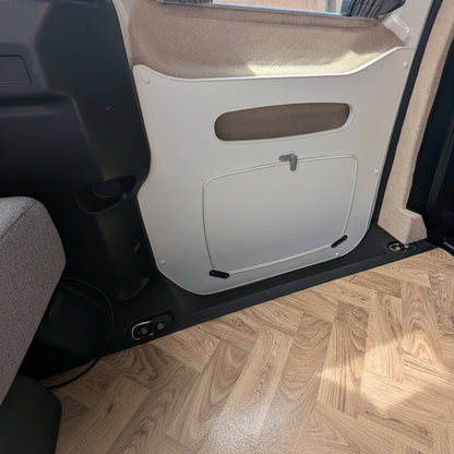 Sliding door table insert fitted inside The Wyre VW ID. Buzz electric campervan conversion by CCCAMPERS.