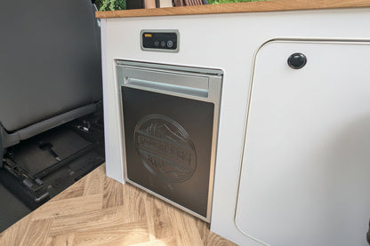 Compact 35L smart compressor fridge installed inside The Wyre VW ID. Buzz electric campervan by CCCAMPERS.