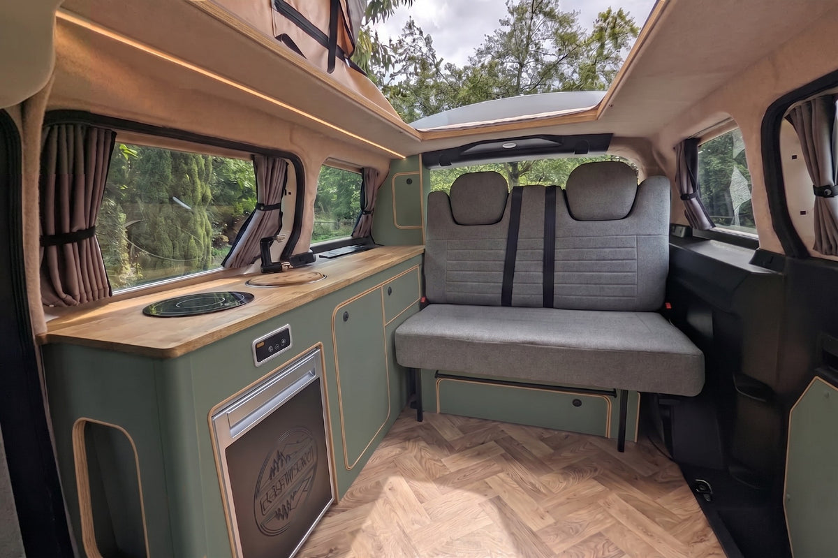 Smoke Green and oak Interior detail of The Wyre VW ID. Buzz electric campervan by CCCAMPERS, showcasing premium British-built fit and finish.