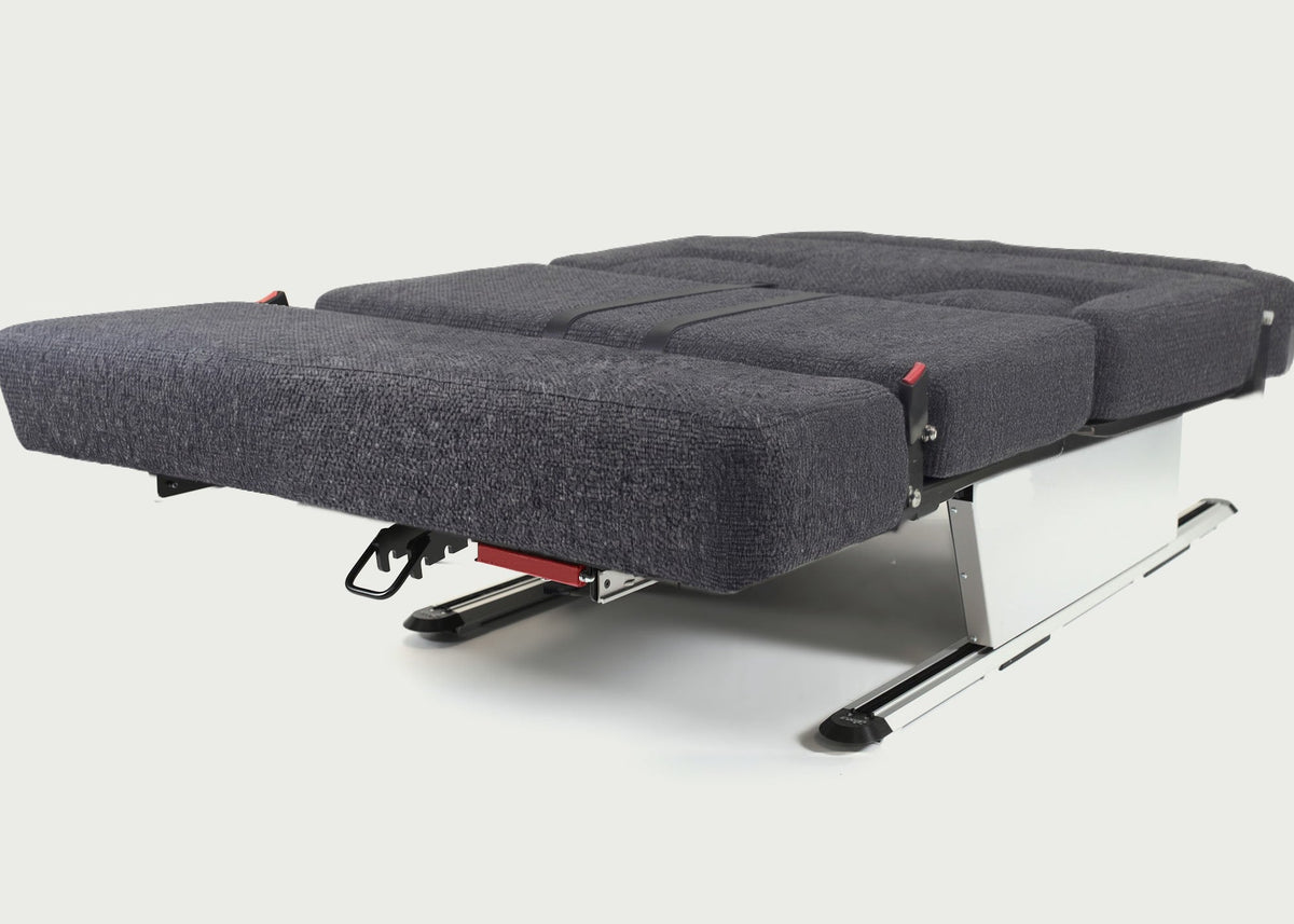 Kia PV5 campervan Shelsley sliding bed laid flat, with a 1,100mm /  3ft 7.31in wide by 1,830mm / 6ft long sleeping surface
