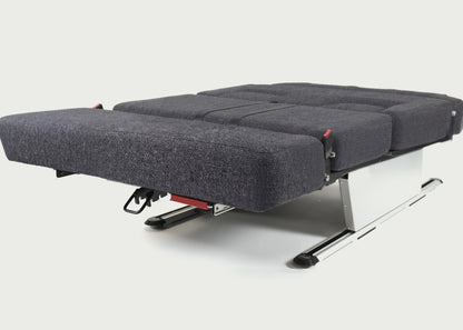 Kia PV5 campervan Shelsley sliding bed laid flat, with a 1,100mm /  3ft 7.31in wide by 1,830mm / 6ft long sleeping surface