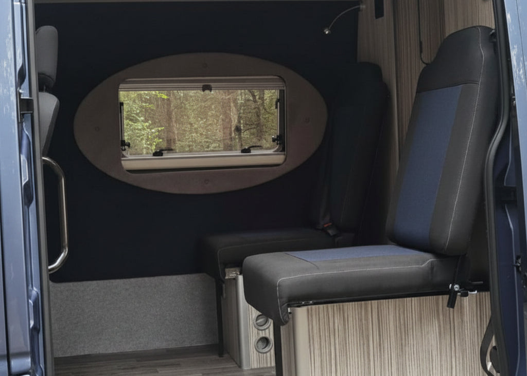 Interior of a van with a window and seating area