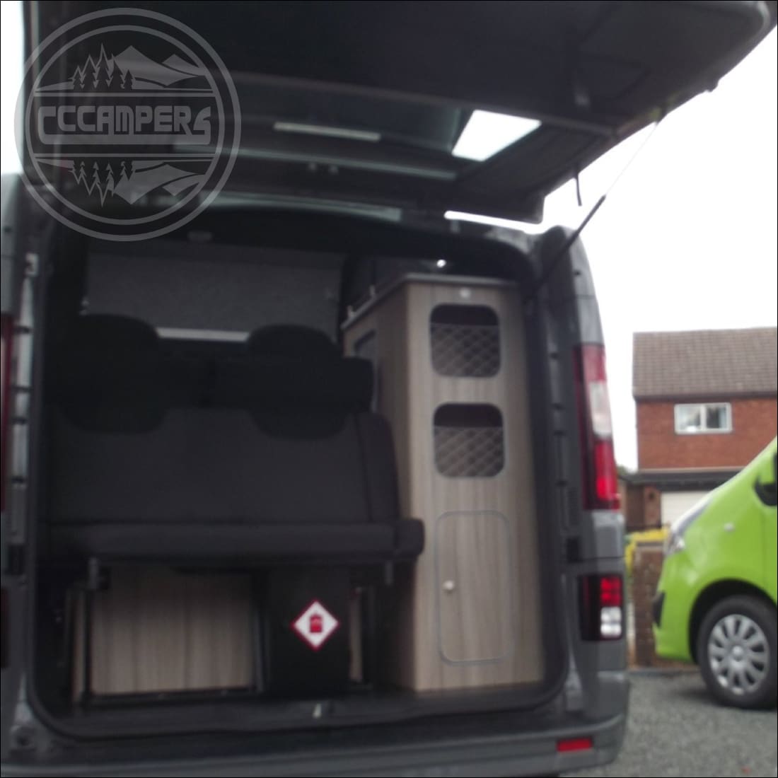 Nissan Factory option 90 degree glazed tailgate door with wash & wipe - cccampers.myshopify.com